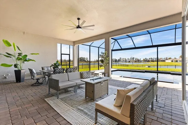 an aerial view of a house with a swimming pool