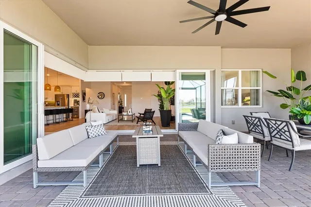 an aerial view of a house with a swimming pool