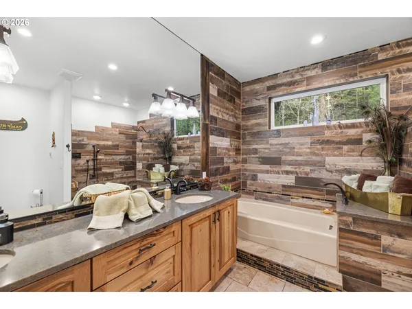 a kitchen with a sink and wooden cabinets