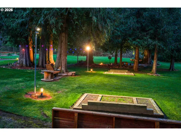 a view of a park with swings and slides