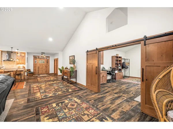 a view of a living room and a fireplace