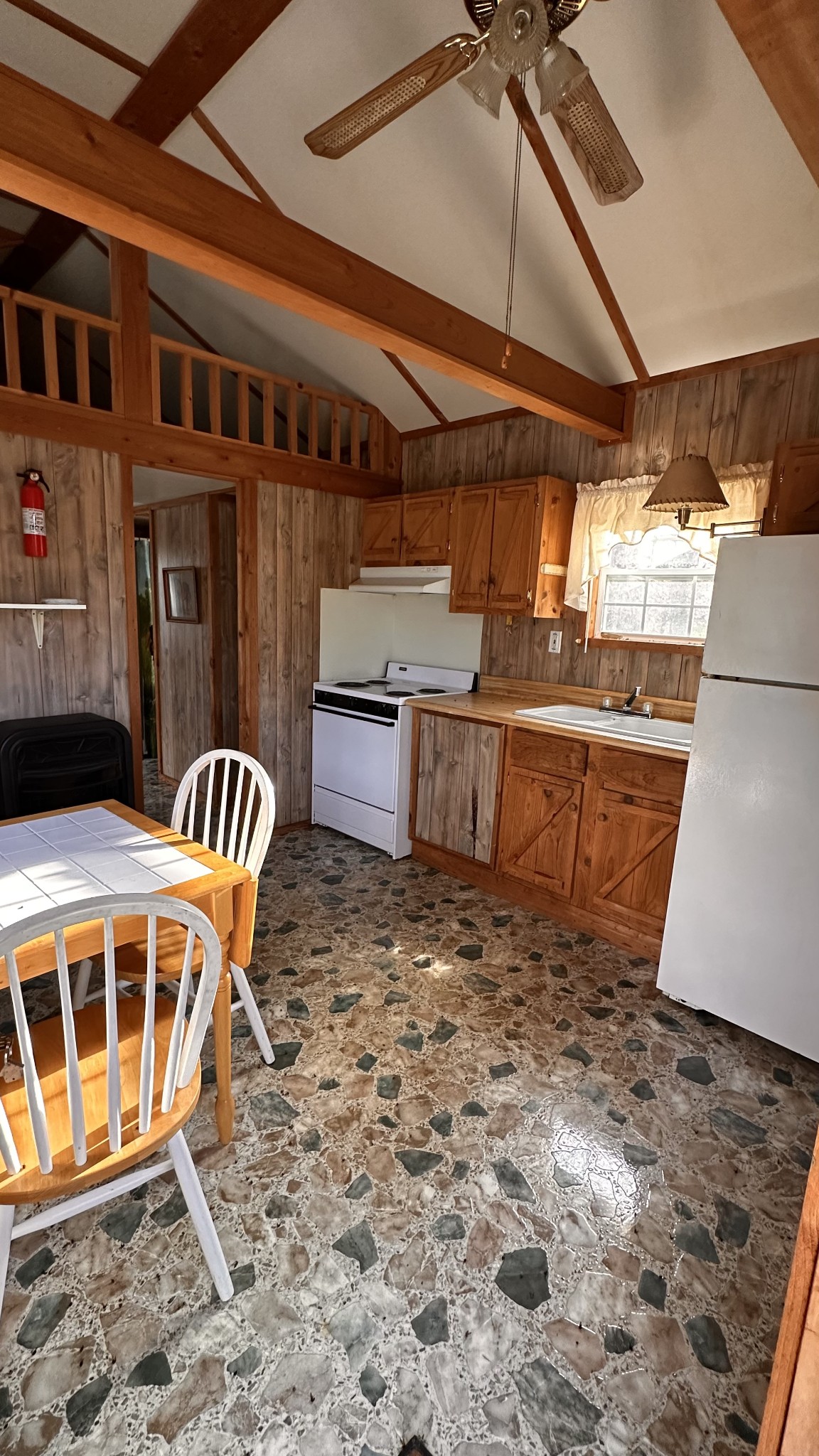 911 Petersburg-Chestnut Ridge Road Petersburg, TN 37144 - Photo 13 of 57 a view of a chairs and table in the patio