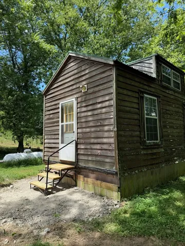 a view of a golf course with trees