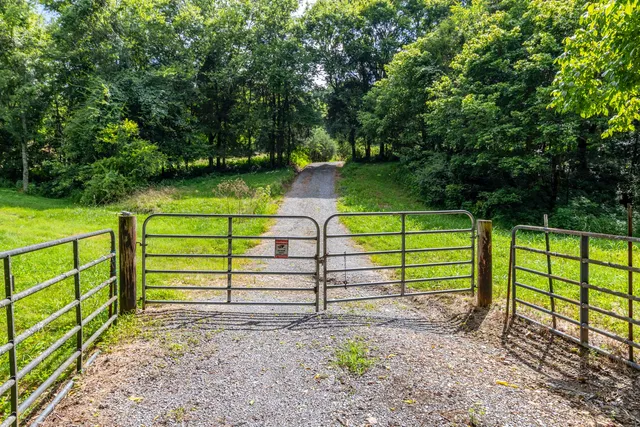 a view of a wooden door of the house