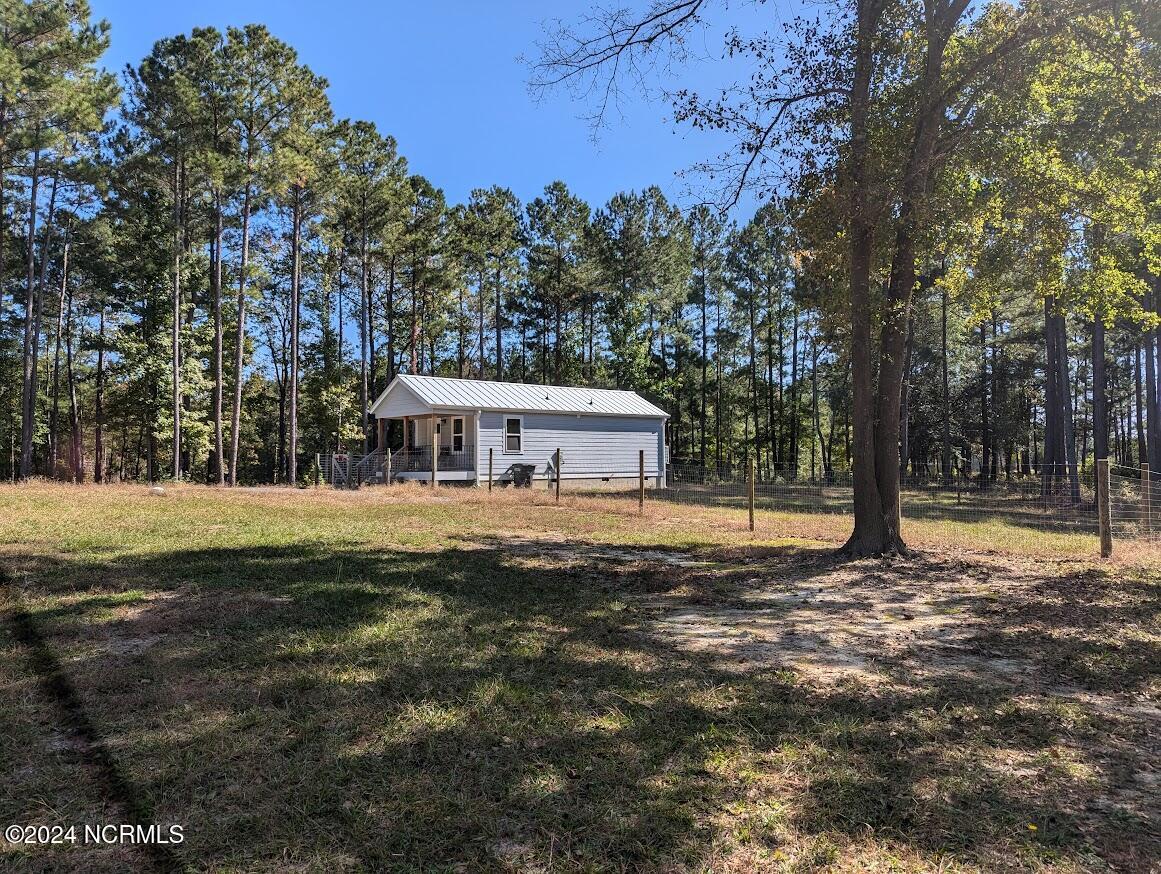 3255 Lakebay Road Vass, NC 28394 - Photo 23 of 31 right front of property.