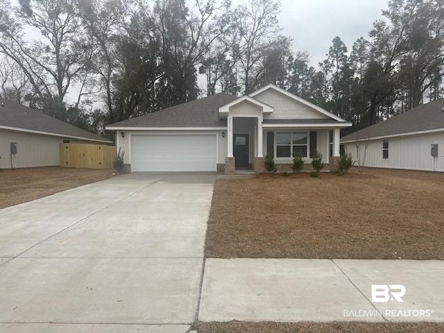 24730 Ponder Loop Loxley, AL 36551 - Photo 1 of 34 View of front of property featuring a garage