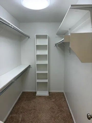 a house with trees in the background