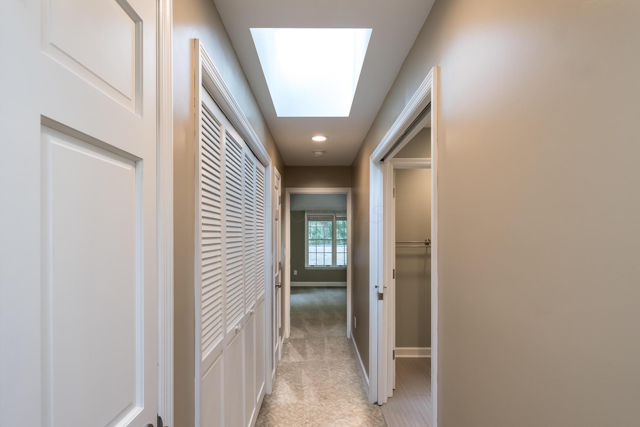 356 Gudrun Road Columbus, OH 43202 - Photo 27 of 53 Skylit hall way to owners suite