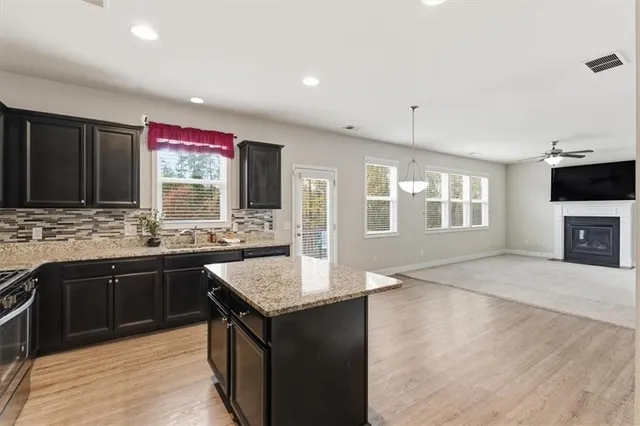 a white bath tub sitting in a bathroom