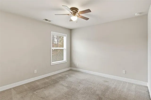 a view of a balcony with wooden floor