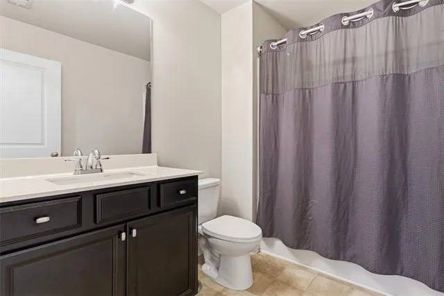 a view of a house with a yard and table and chair