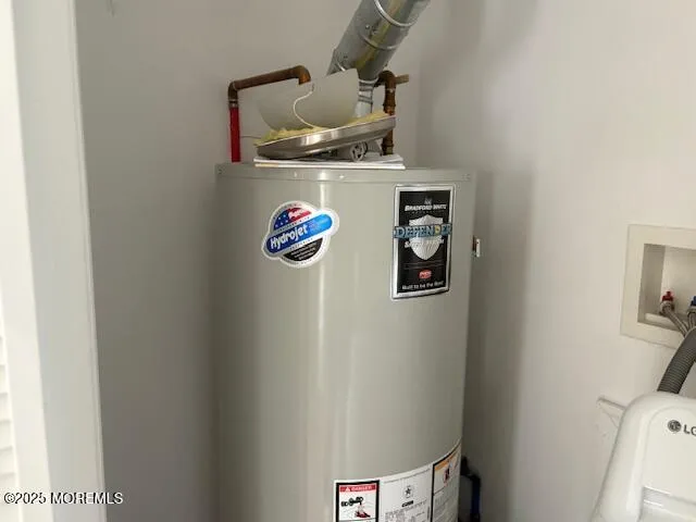 a kitchen with a refrigerator and cabinets