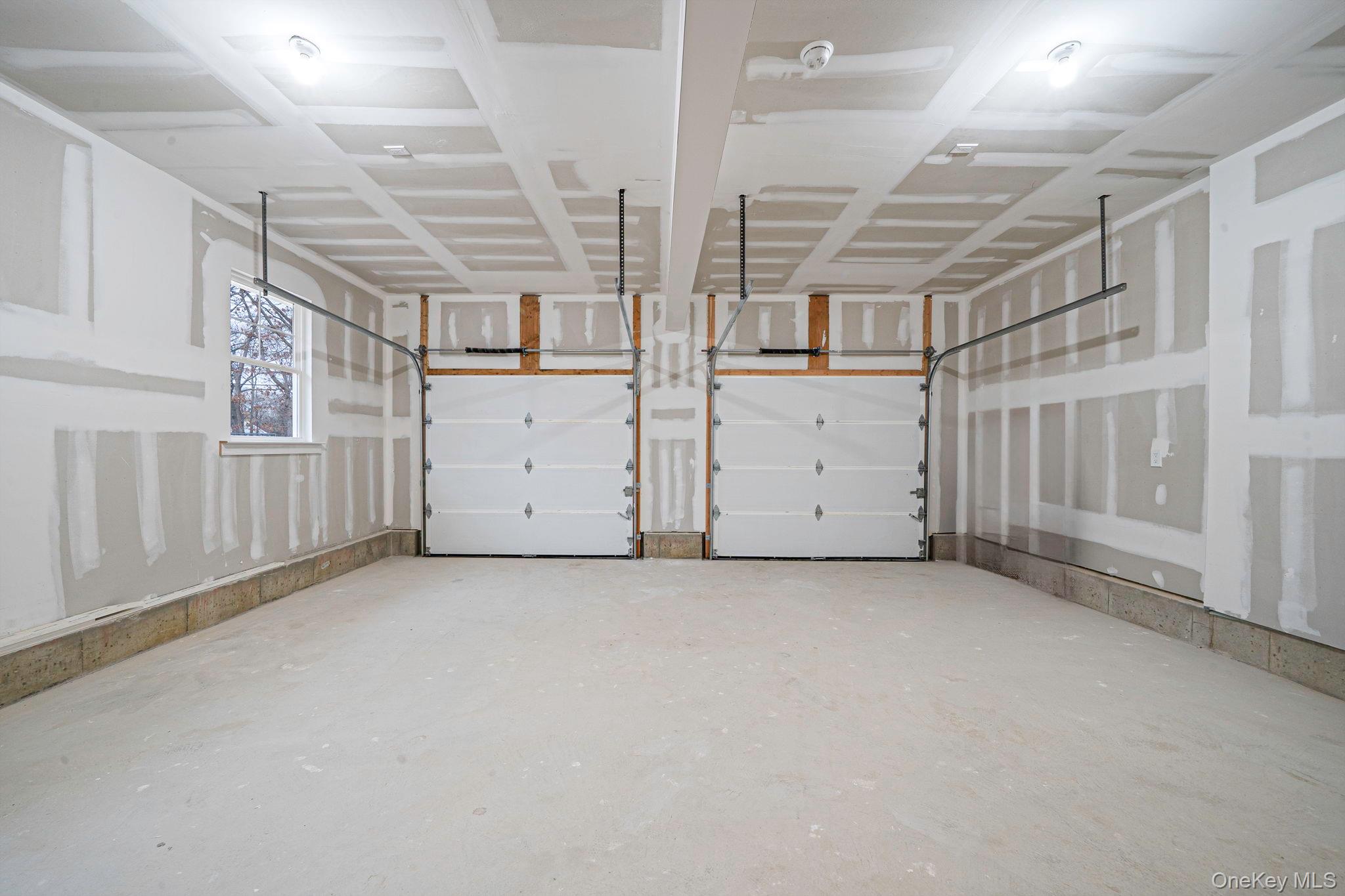 63 B Blydenburgh Road Centereach, NY 11720 - Photo 34 of 38 an empty room with windows