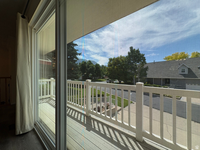 595 Meadowlark Road Orem, UT 84097 - Photo 13 of 87 Outdoor balcony featuring wood-finish decking and white railings