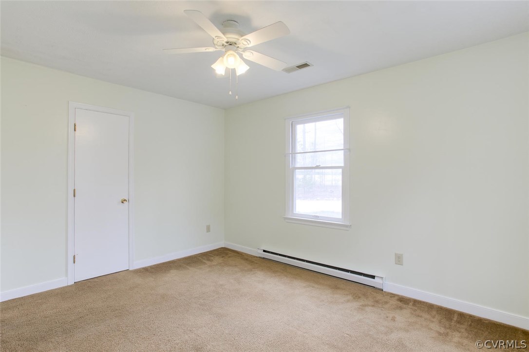 7413 River Road Hanover, VA 23069 - Photo 23 of 30 an empty room with a window
