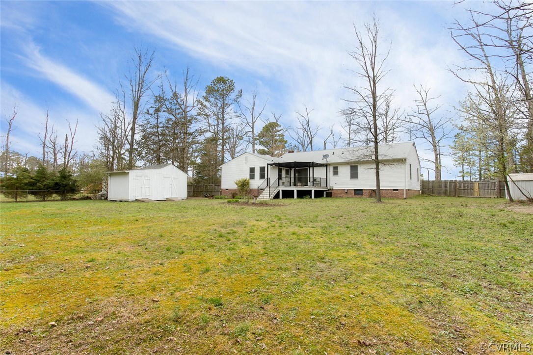 7413 River Road Hanover, VA 23069 - Photo 26 of 30 a front view of house with yard and seating