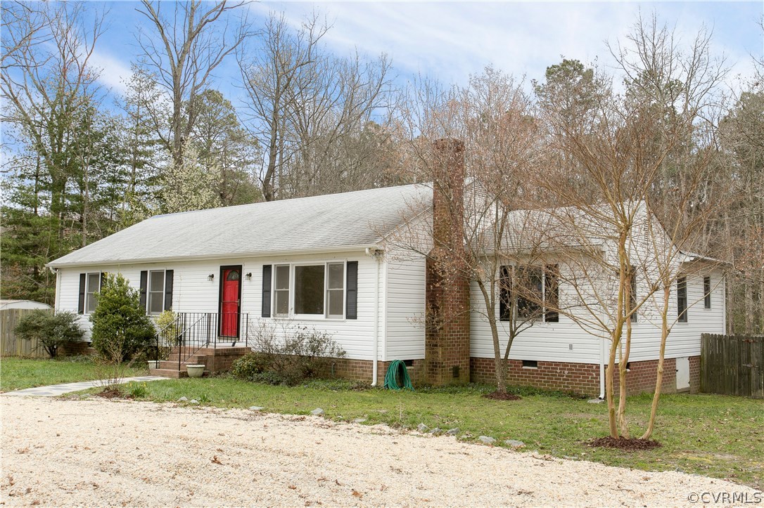 7413 River Road Hanover, VA 23069 - Photo 30 of 30 a view of a house with a yard