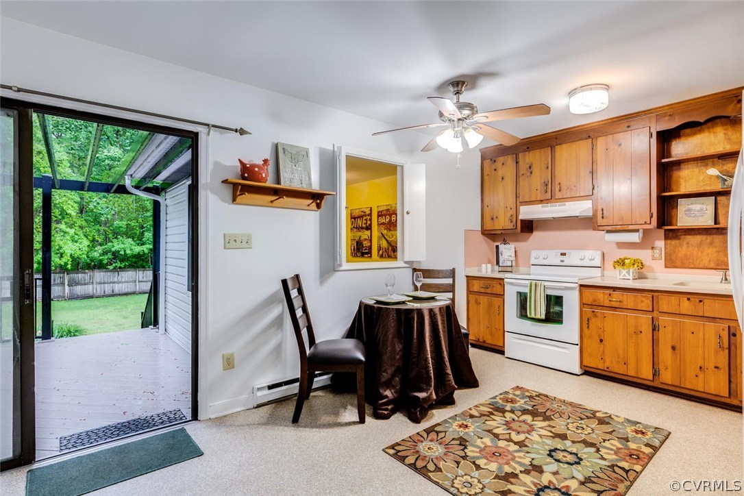 7413 River Road Hanover, VA 23069 - Photo 3 of 30 a kitchen with stainless steel appliances granite countertop sink stove top oven and cabinets