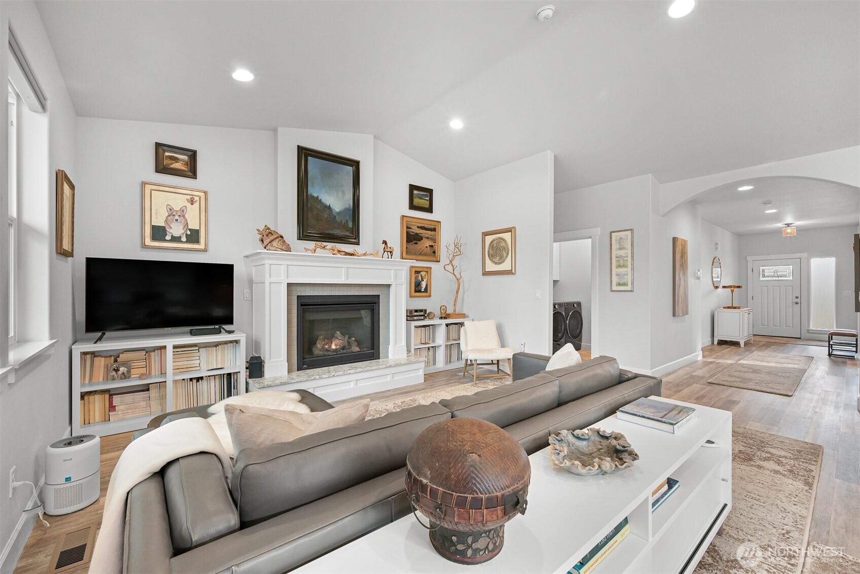5457 Shields Road Ferndale, WA 98248 - Photo 17 of 39 a living room with furniture and a flat screen tv