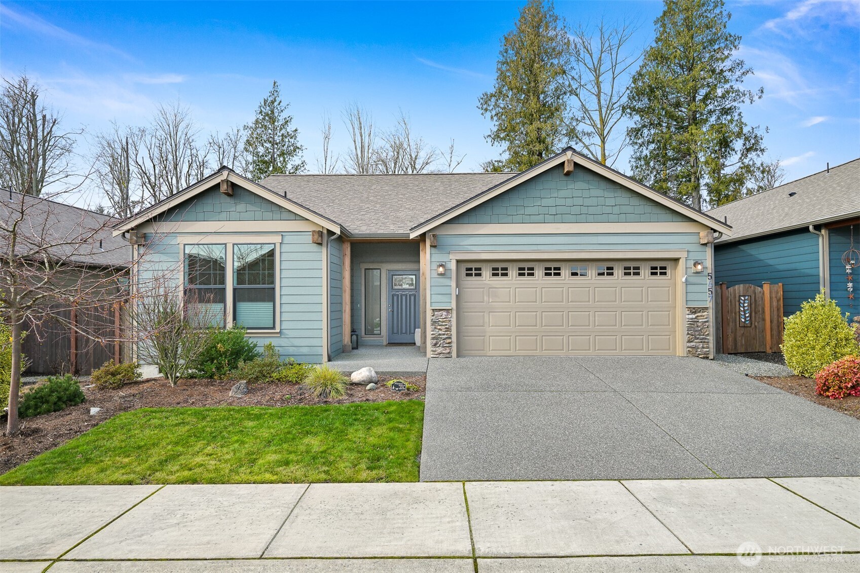5457 Shields Road Ferndale, WA 98248 - Photo 3 of 39 a front view of a house with garden