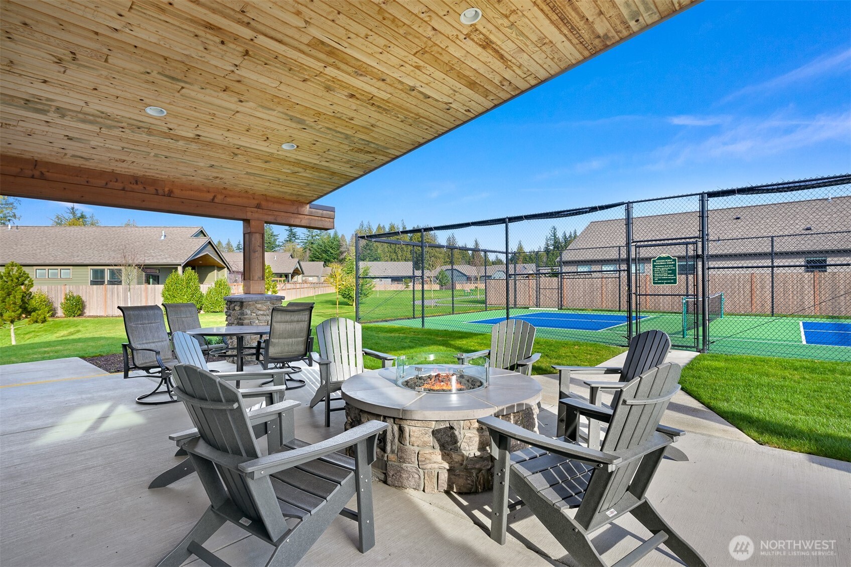5457 Shields Road Ferndale, WA 98248 - Photo 38 of 39 a view of a patio with a table and chairs