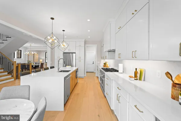 a view of a dining room with furniture and window