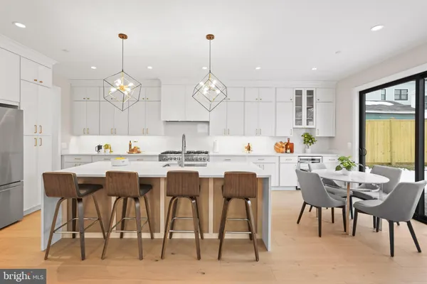 a bedroom with bed and a couch