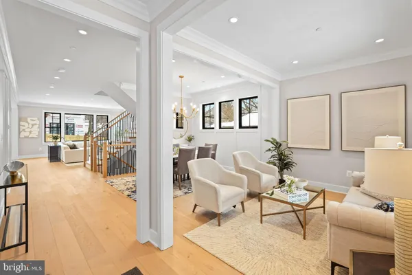 a living room with furniture and a table