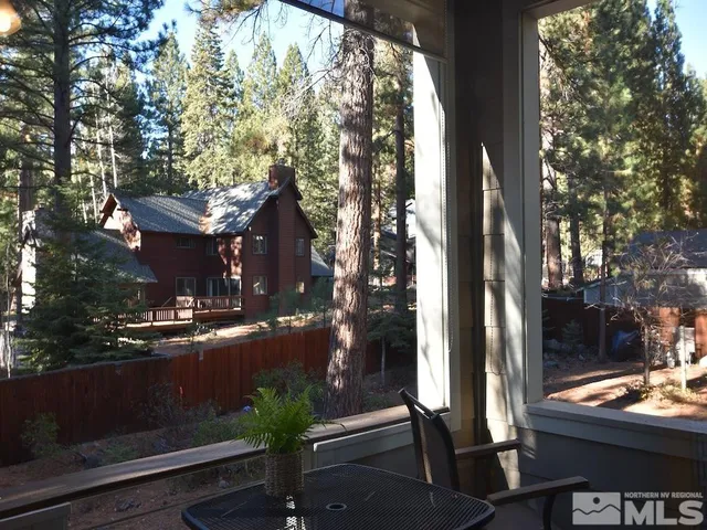 a view of street from balcony