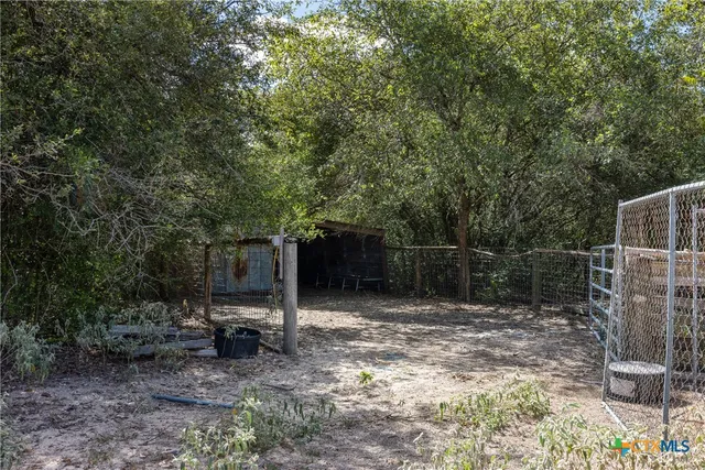a view of house with patio outdoor seating space
