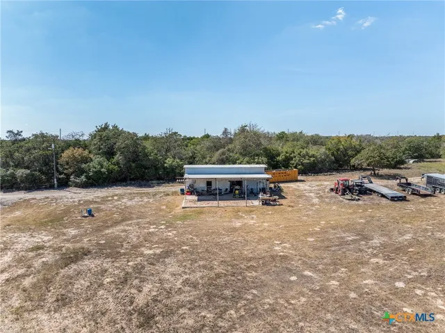 a view of a lake with houses with yard
