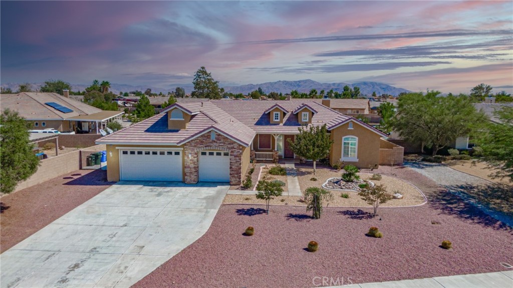 12237 Braeburn Road Apple Valley, CA 92308 - Photo 1 of 1 an aerial view of a house with yard swimming pool and outdoor seating
