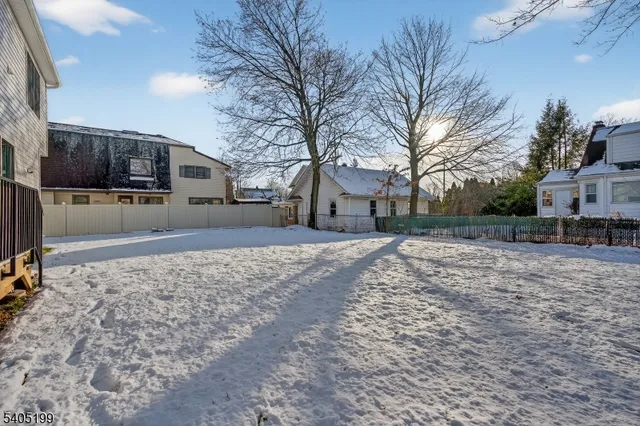 a view of a yard with a snow