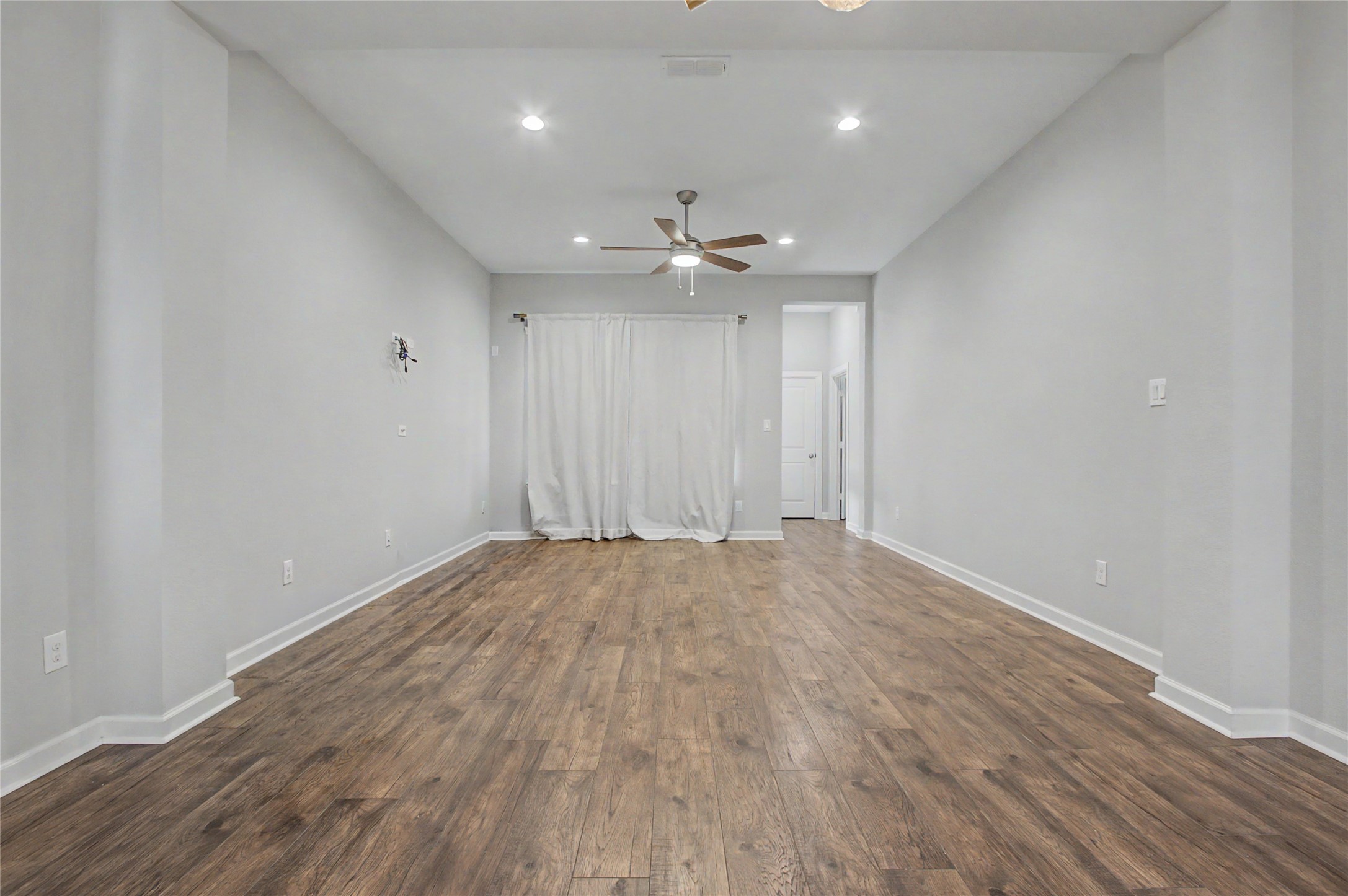 19718 Shinnery Ridge Court Cypress, TX 77433 - Photo 7 of 23 wooden floor in an empty room