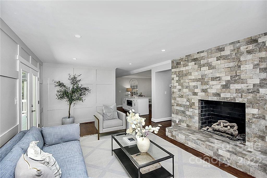 225 Morning Dale Road Matthews, NC 28105 - Photo 18 of 48 a living room with furniture and a fireplace