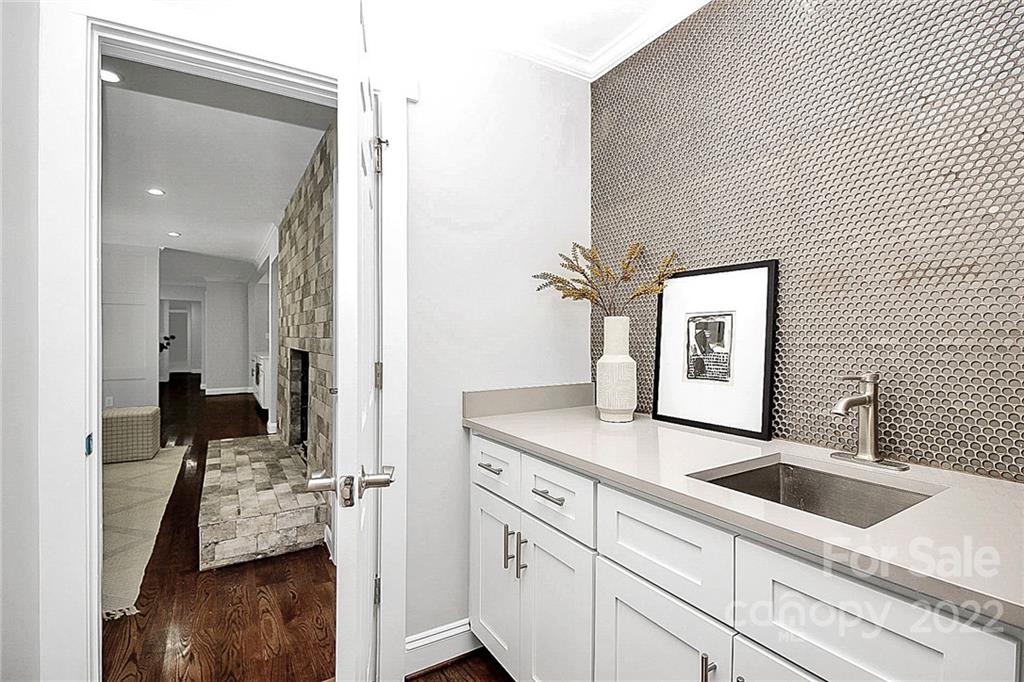225 Morning Dale Road Matthews, NC 28105 - Photo 19 of 48 a en suite bathroom with a sink and mirror