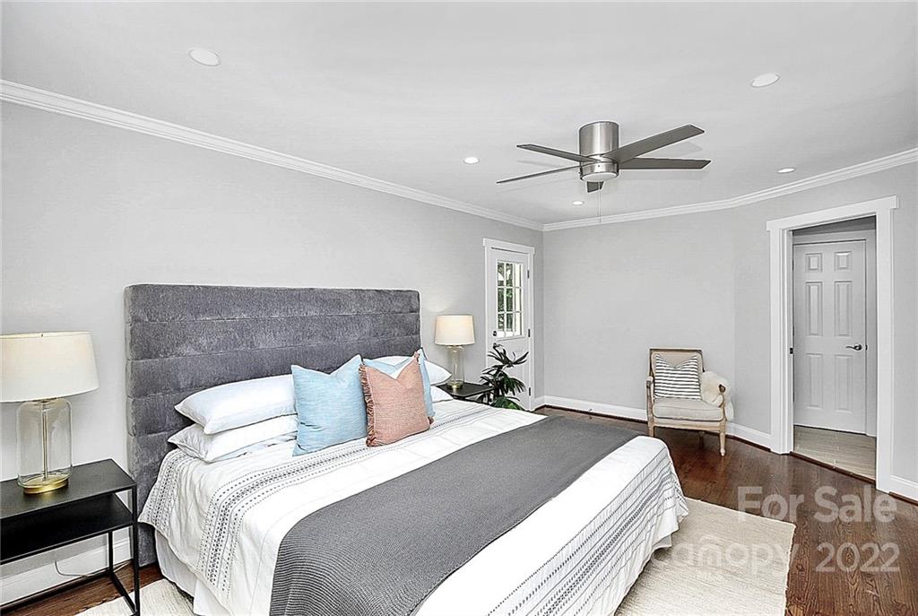 225 Morning Dale Road Matthews, NC 28105 - Photo 21 of 48 a bedroom with a bed and a lamp