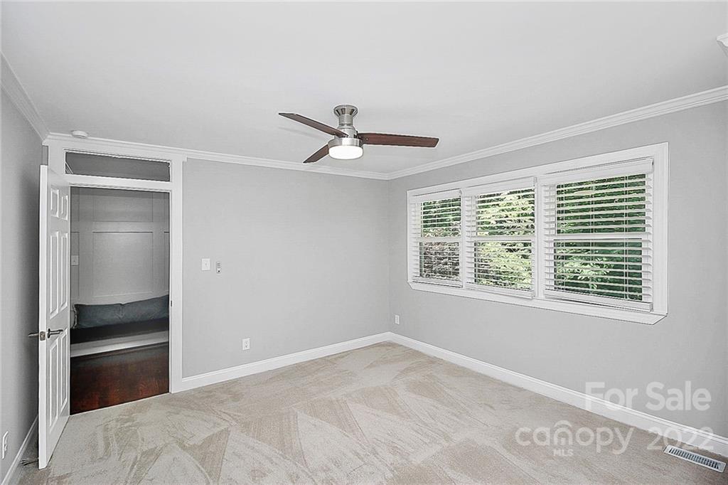 225 Morning Dale Road Matthews, NC 28105 - Photo 30 of 48 a view of a livingroom with a ceiling fan and a window