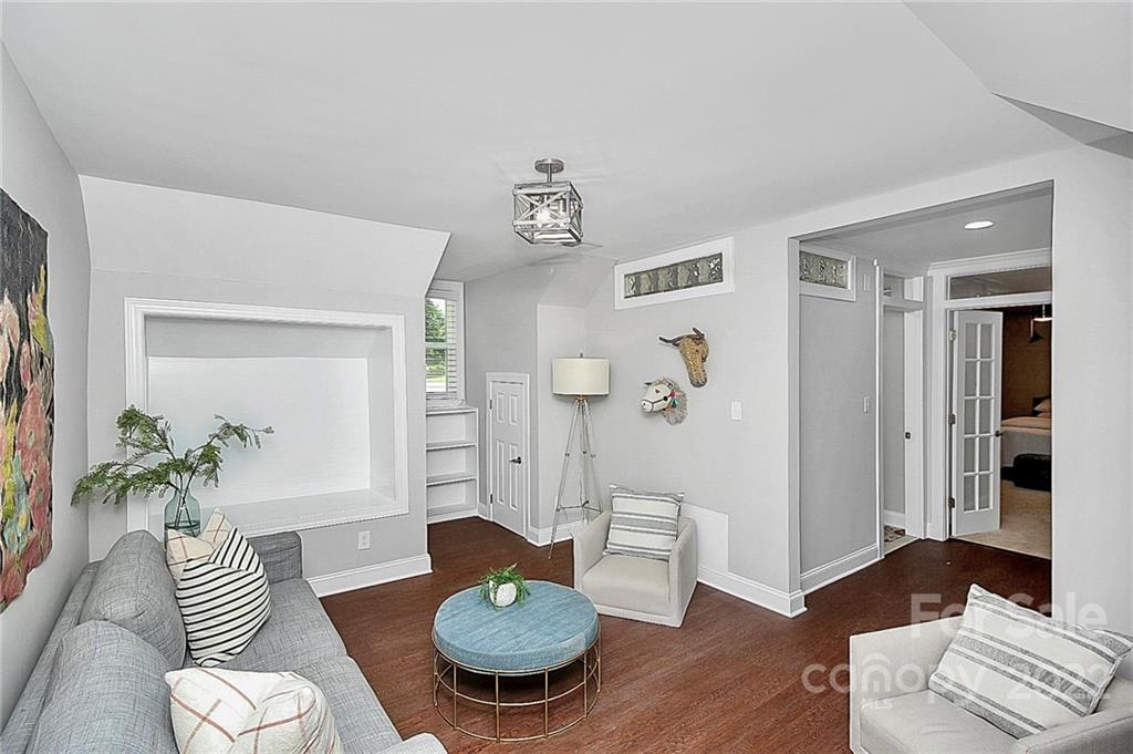 225 Morning Dale Road Matthews, NC 28105 - Photo 36 of 48 a living room with furniture and a table