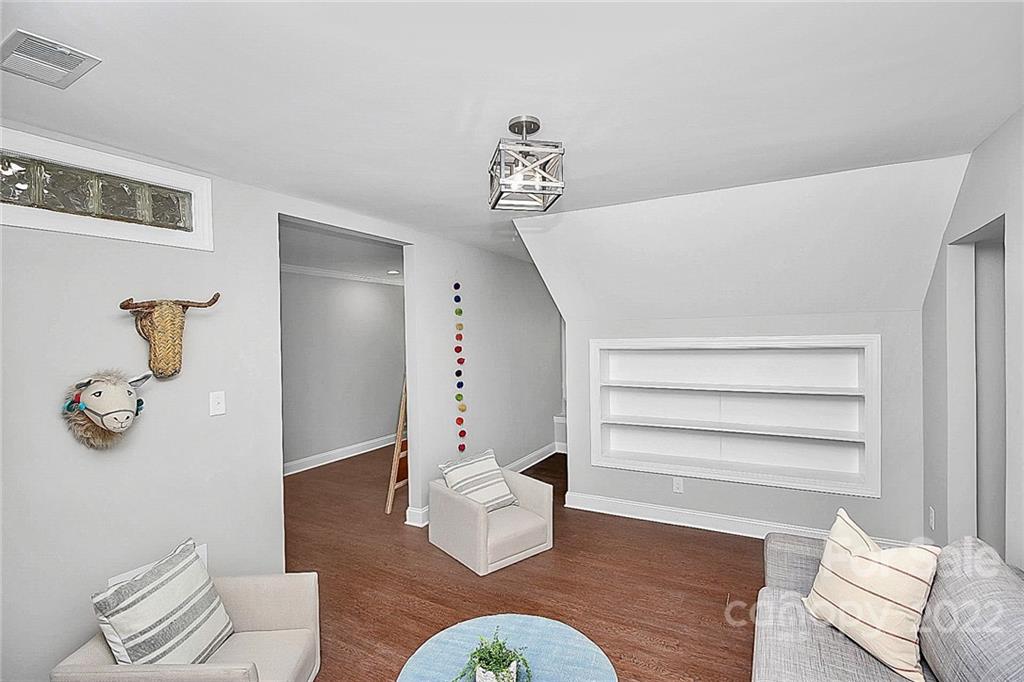 225 Morning Dale Road Matthews, NC 28105 - Photo 37 of 48 a view of livingroom with furniture and wooden floor