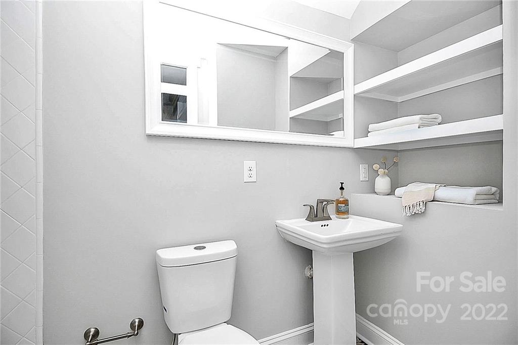 225 Morning Dale Road Matthews, NC 28105 - Photo 39 of 48 a bathroom with a sink and a toilet