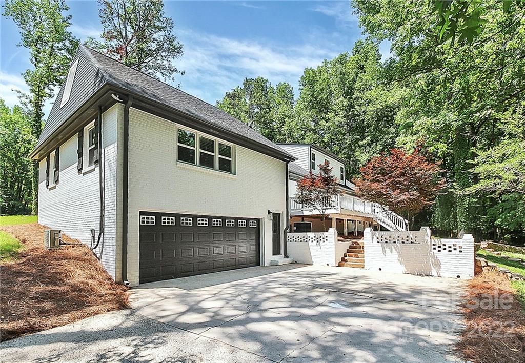 225 Morning Dale Road Matthews, NC 28105 - Photo 43 of 48 a view of a house with a outdoor space and tree