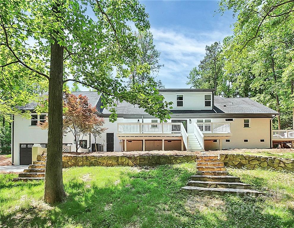 225 Morning Dale Road Matthews, NC 28105 - Photo 45 of 48 a front view of a house with a yard
