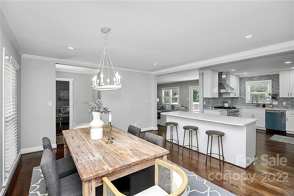 225 Morning Dale Road Matthews, NC 28105 - Photo 6 of 48 a large kitchen with a table and chairs