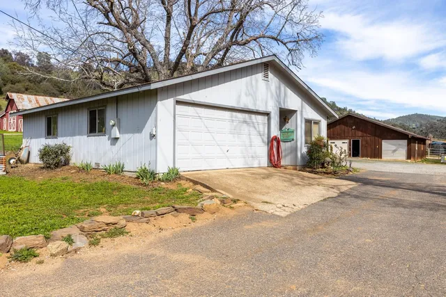 a house view with a garden space