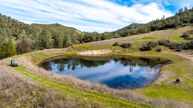 a view of a lake with mountains in the background