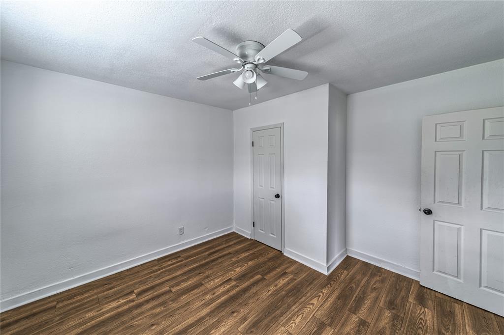 500 County Road 3724 Wills Point, TX 75169 - Photo 20 of 32 an empty room with a fan and a ceiling fan