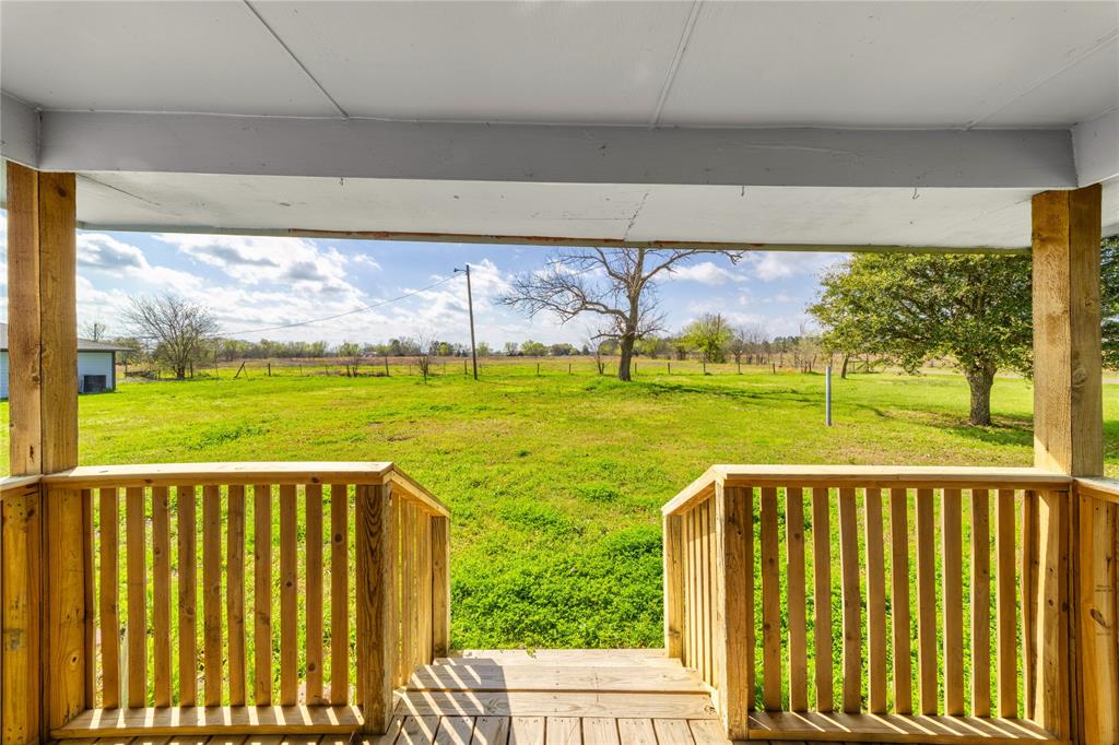 500 County Road 3724 Wills Point, TX 75169 - Photo 22 of 32 a view of a balcony with an ocean