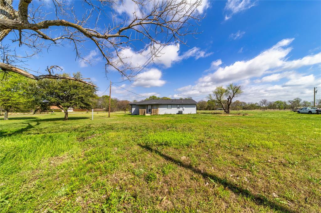 500 County Road 3724 Wills Point, TX 75169 - Photo 24 of 32 a view of yard with an house and garden space