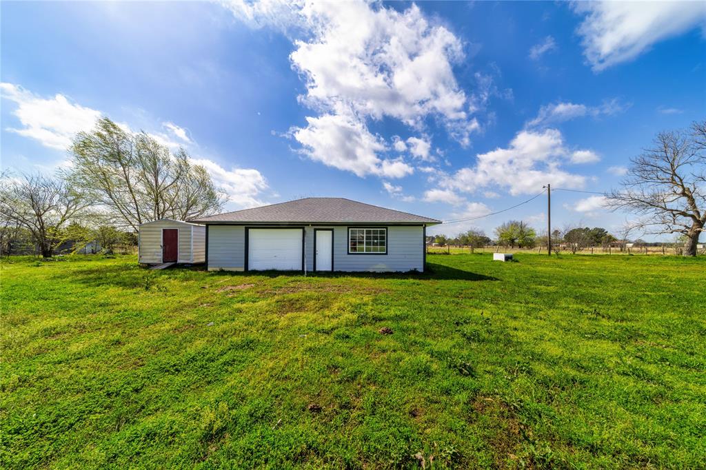 500 County Road 3724 Wills Point, TX 75169 - Photo 25 of 32 a view of a house with a yard